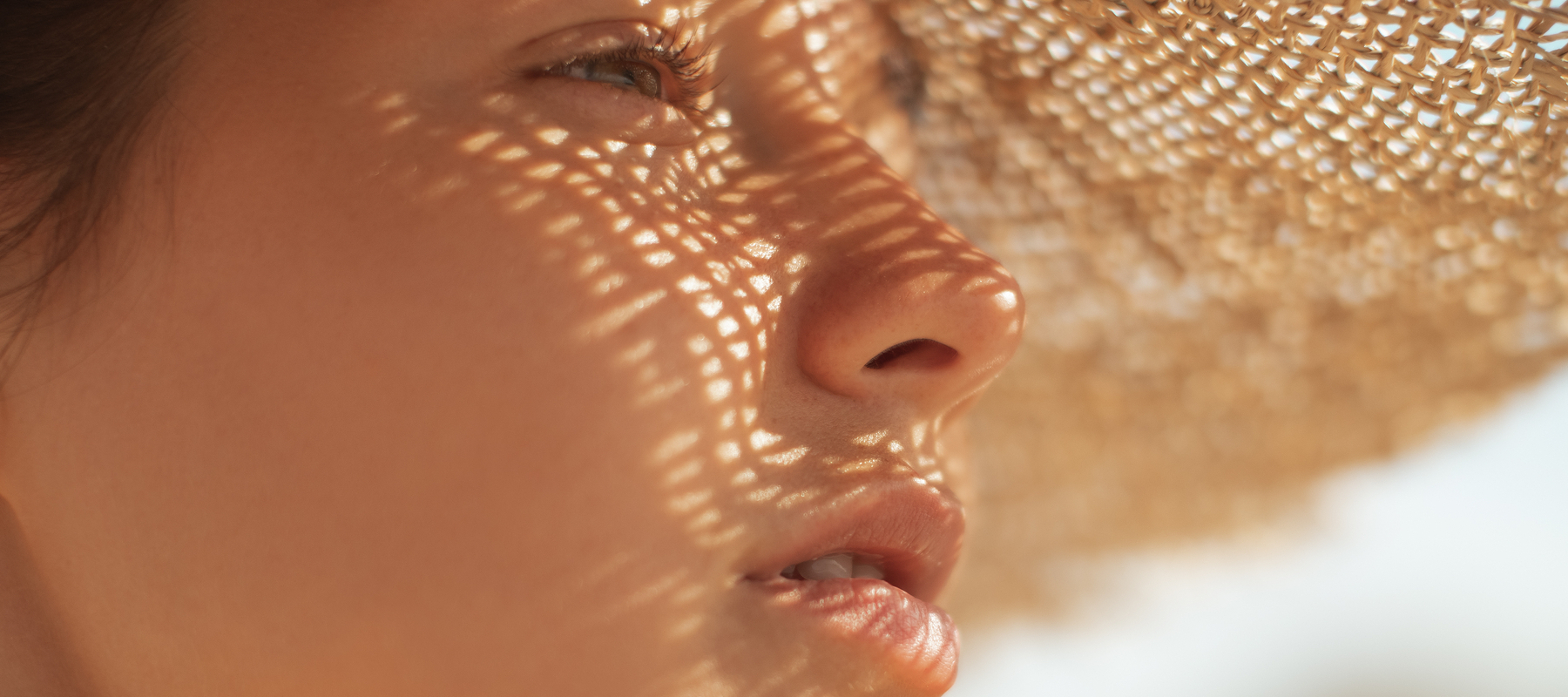 skin and sun woman in sun hat