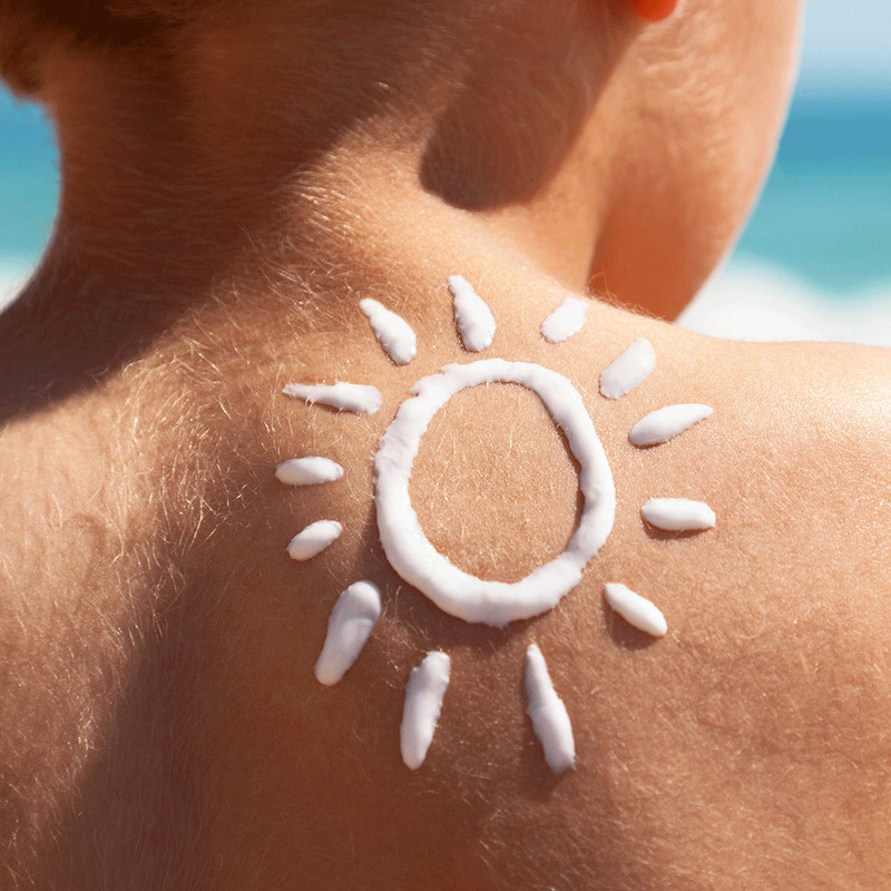 sun and skin child with sunscreen